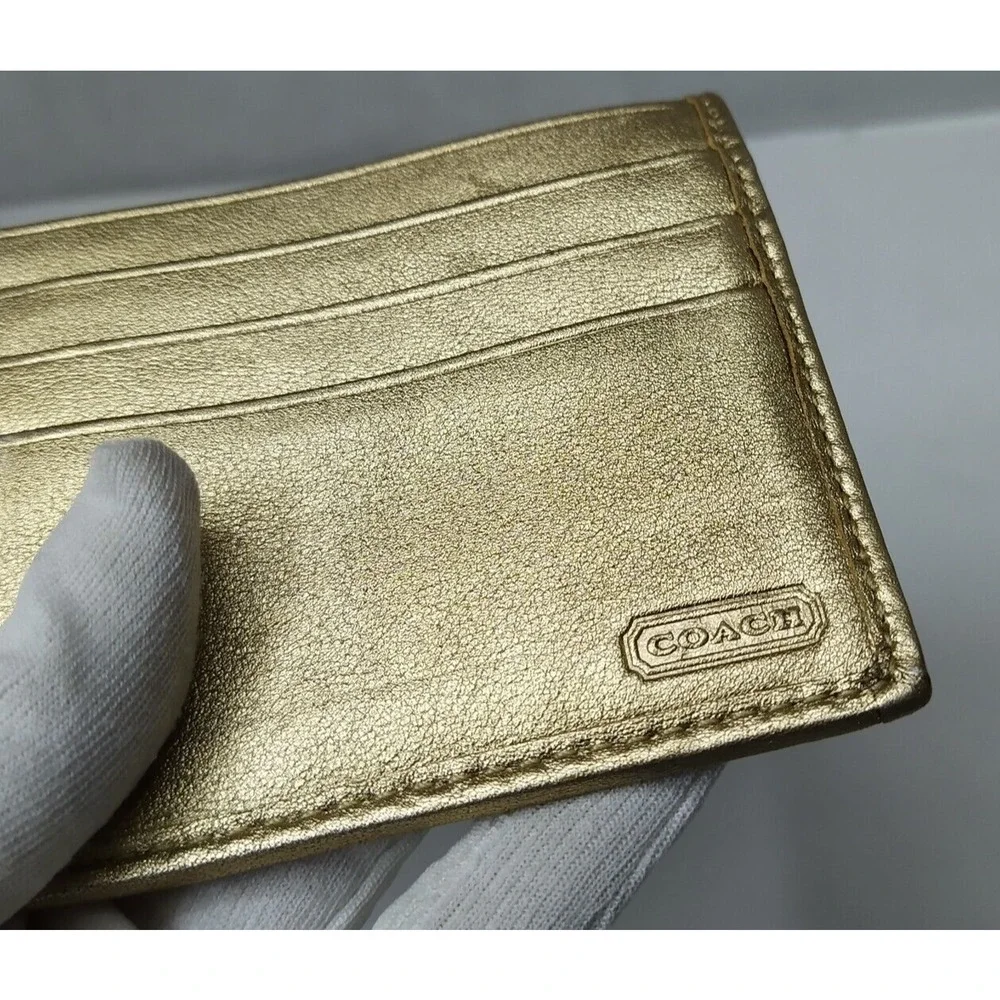 Coach Bleecker Signature Brown Canvas Gold Leather Buckle Trifold Wallet